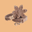 a dog leash with a flower on it